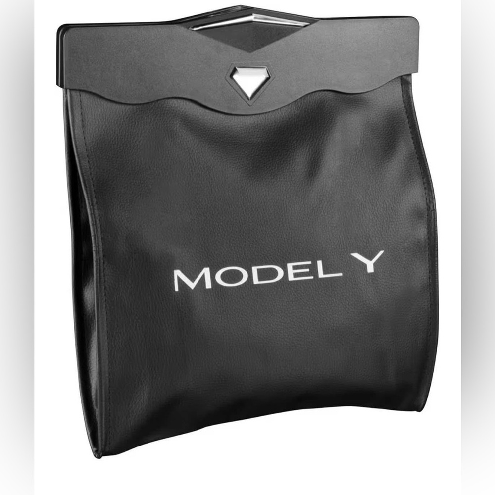 Tesla Model Y trash bag, magnet shut and led lights built inside activated open.